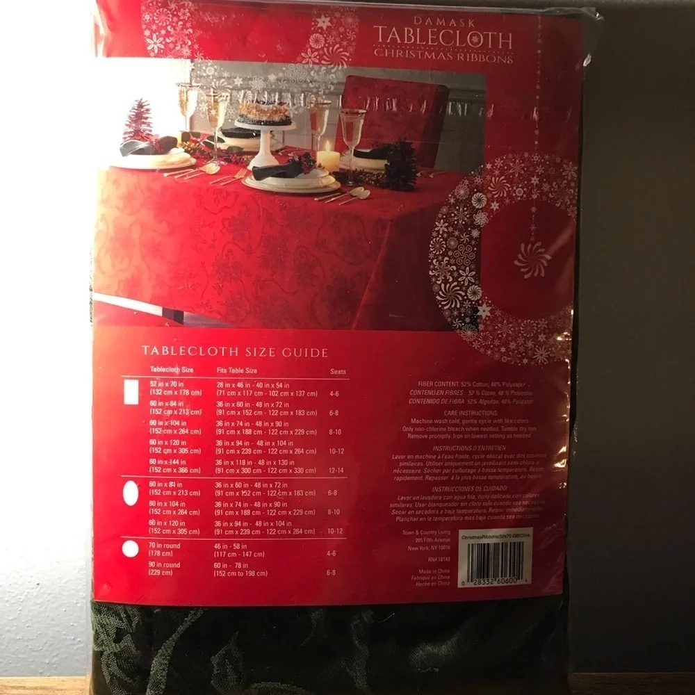 Damask Christmas Ribbon tablecloth. Size 52 x 70 oblong . Color is green